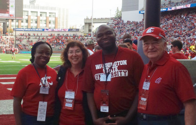 From left to right, Tolu Adesope, Erica Austin, Sola Adesope, and Ron Mittelhammer relished the Cougars' victory over Oregon State at Martin Stadium. Sola Adesope was the Provosts' Featured Faculty Member for the game.